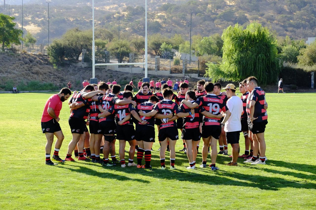 Rugby, equipo en círculo